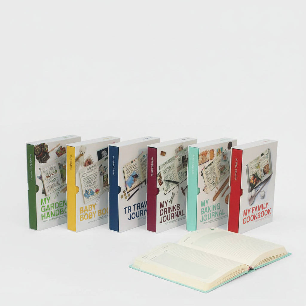My family cookbook journal among a row of colorful book journals with open pages