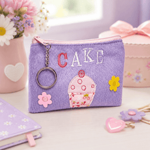 Purple plush zipper coin purse with keyring chain, embroidered cupcake and flower appliques