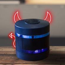 Blue cylindrical Bluetooth speaker with glowing LED band and red sound-wave icons
