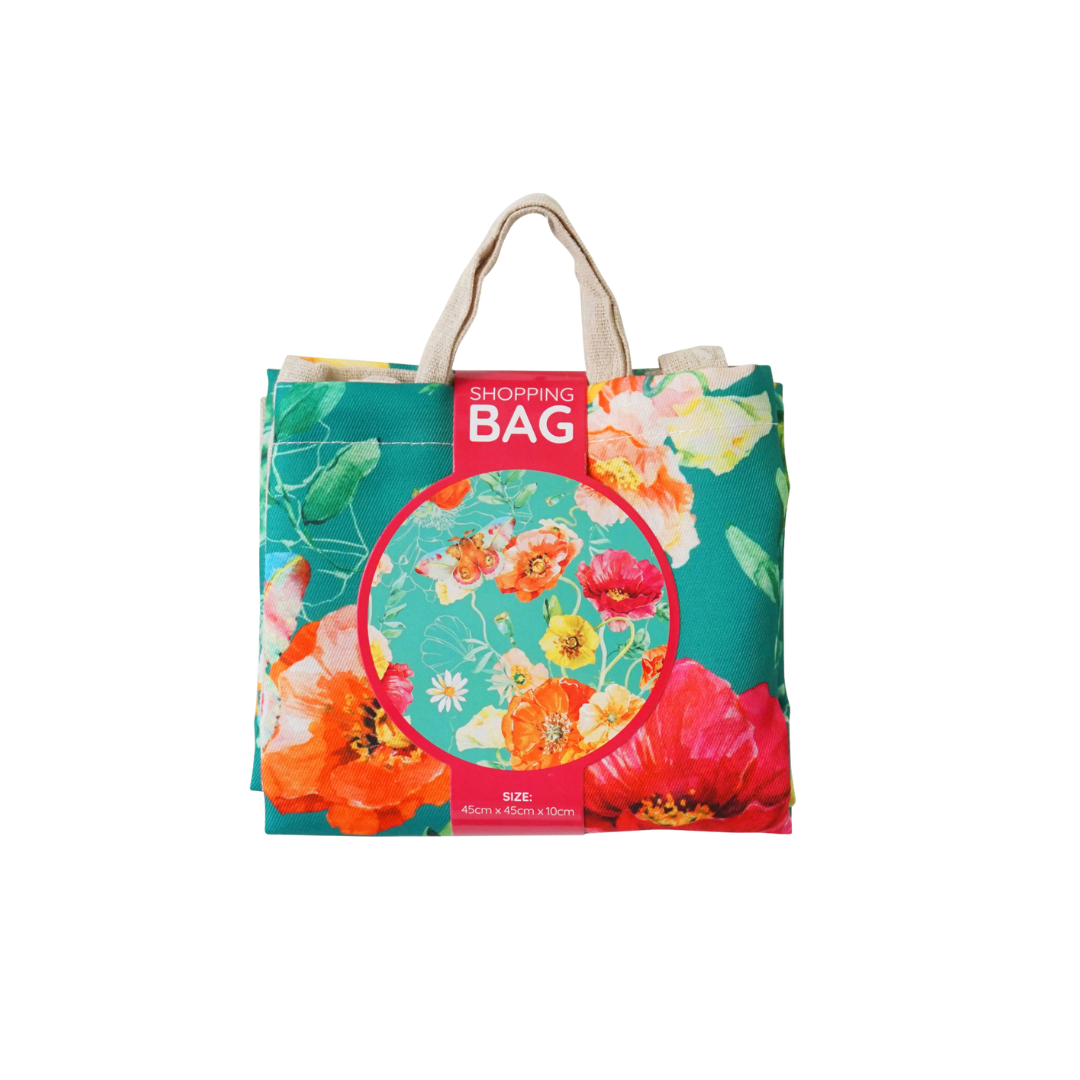 Reusable shopping bag with teal floral print and red 'SHOPPING BAG' label