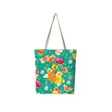 Reusable tote bag with teal base and colorful flower pattern, long white handles