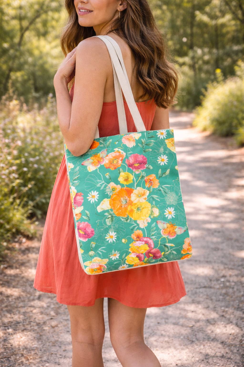 Reusable shopping bag, teal with bright floral print and white carry handles