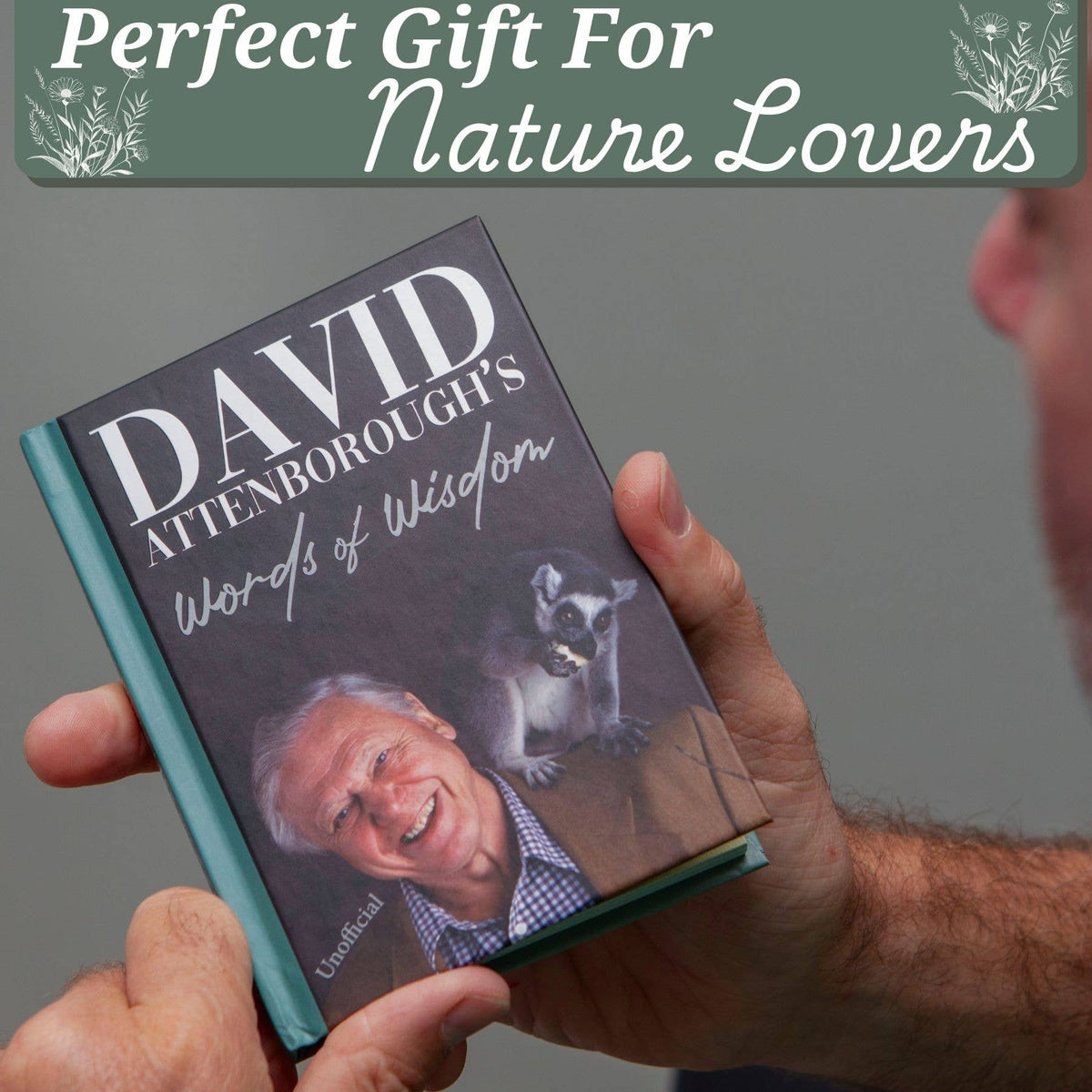 David Attenborough Words of Wisdom book held in hand, front cover close-up