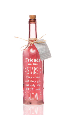 Pink starlight bottle with cork, twine tie, and Friends are like STARS message.