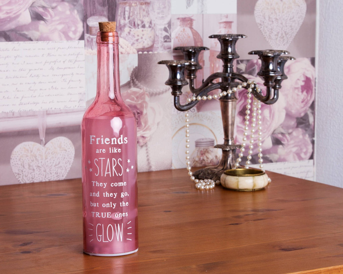 Pink starlight bottle with cork and Friends are like STARS glow text on front.