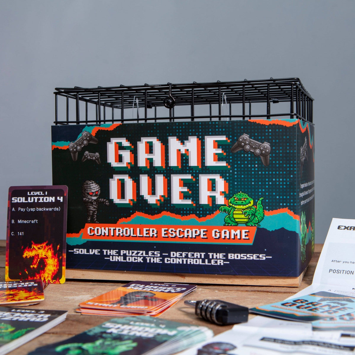 Kids controller escape game board game box with Game Over graphic and controllers