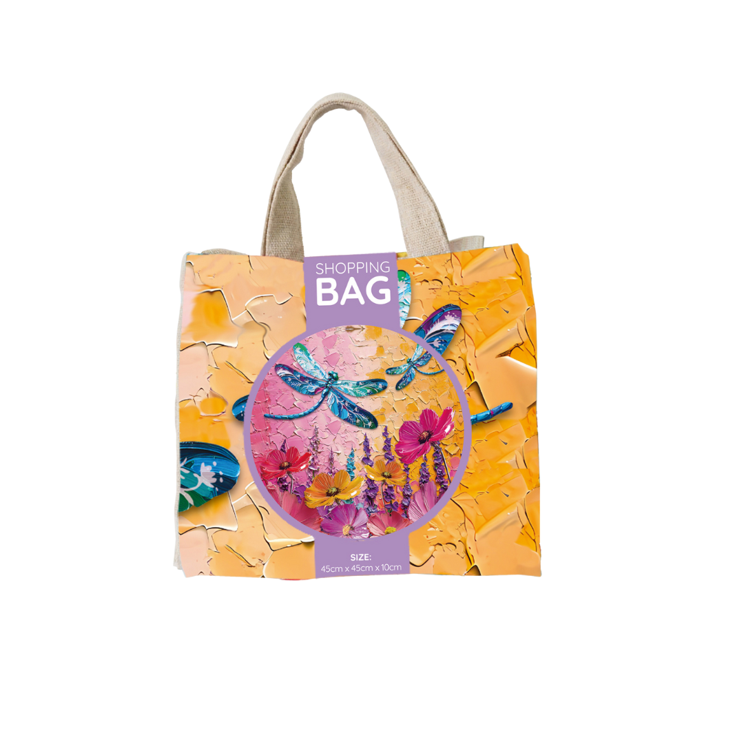 Reusable shopping tote bag with floral bird/dragonfly print and SHOPPING BAG label