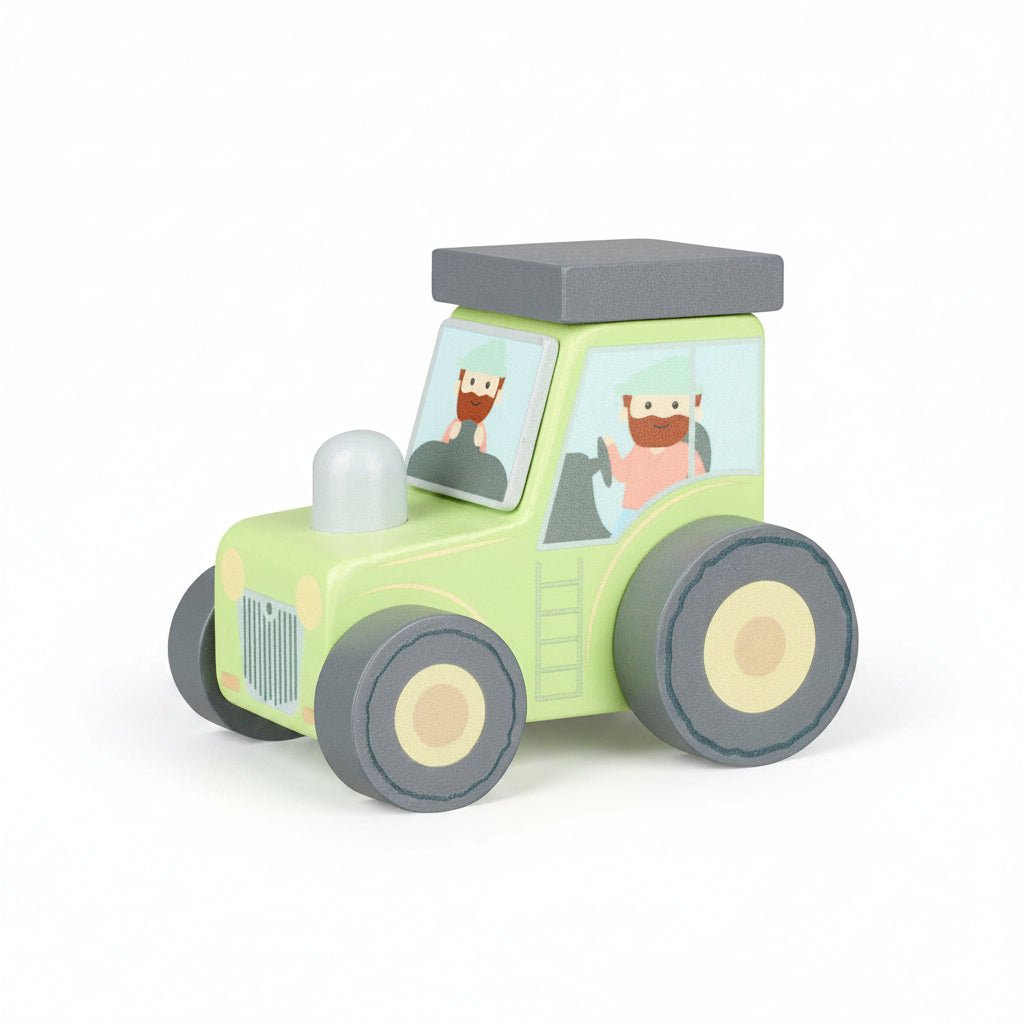 Green wooden tractor toy with gray wheels and cab roof, illustrated driver panels