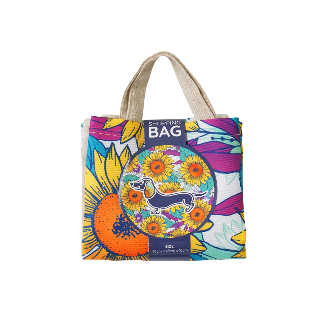 Reusable shopping bag in colorful sunflower dachshund print with 'SHOPPING BAG' label