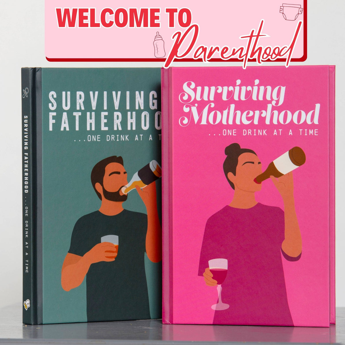 Surviving Motherhood gift book with matching blue and pink covers displayed side by side