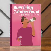 Surviving Motherhood gift book cover, pink design with a woman holding a wine glass