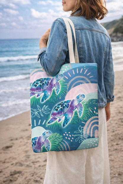 Reusable shopping tote bag with teal sea turtle print and long fabric handles