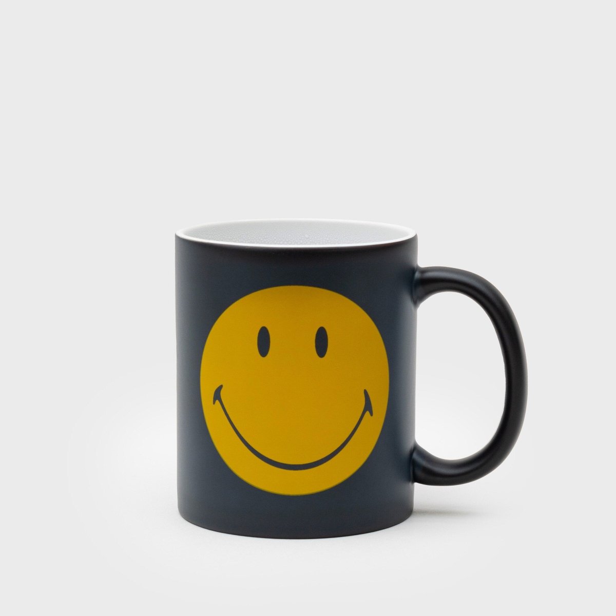 Smiley Face Magic Heat-Sensitive Black and Yellow Mug Gadgets SuckUK Quirky Turkey Gifts