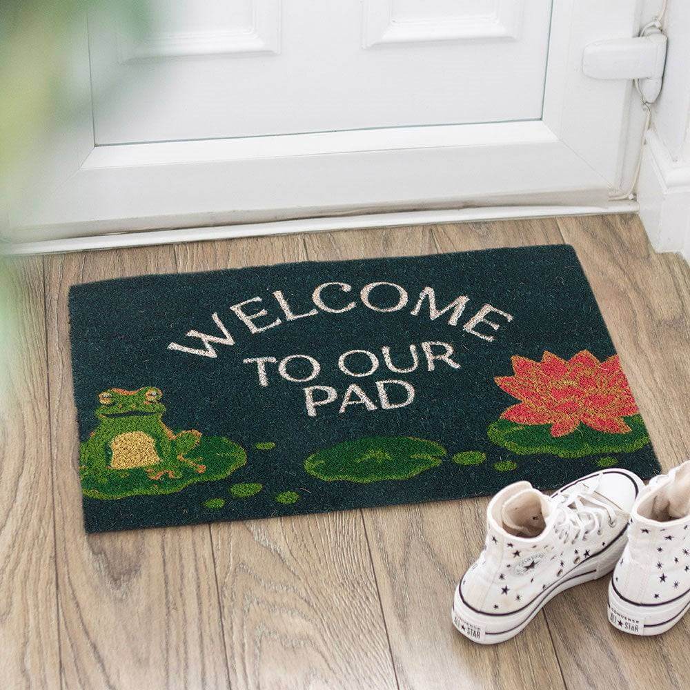 Welcome to Our Pad Doormat Featuring a Sweet Frog and Lily Pad Design Rugs & Doormats Mindful Frog Quirky Turkey Gifts