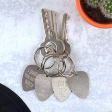 Metal keyring with multiple plectrum-shaped charms engraved with dad messages