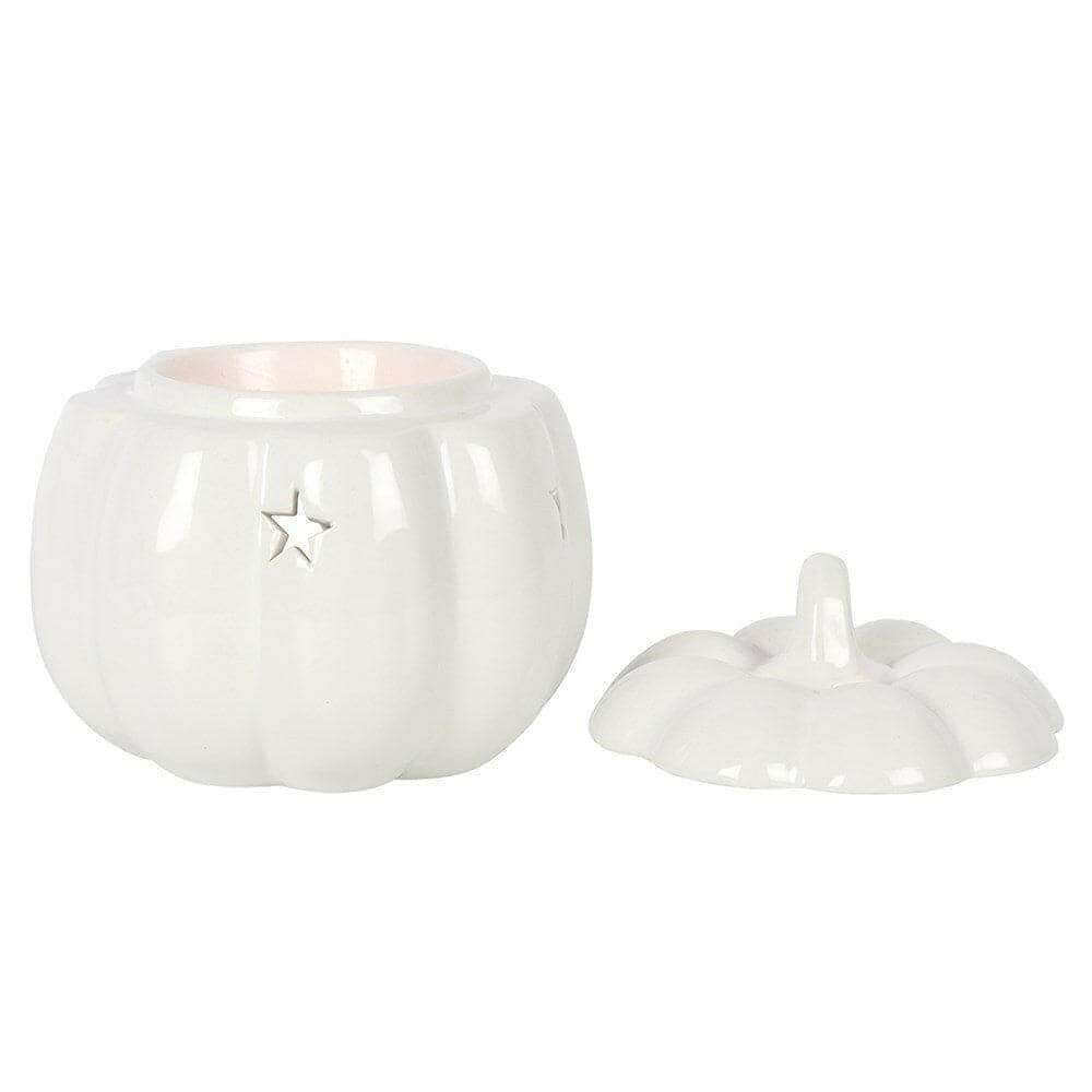 White ceramic pumpkin wax melt burner with hinged lid and star emblem, two views