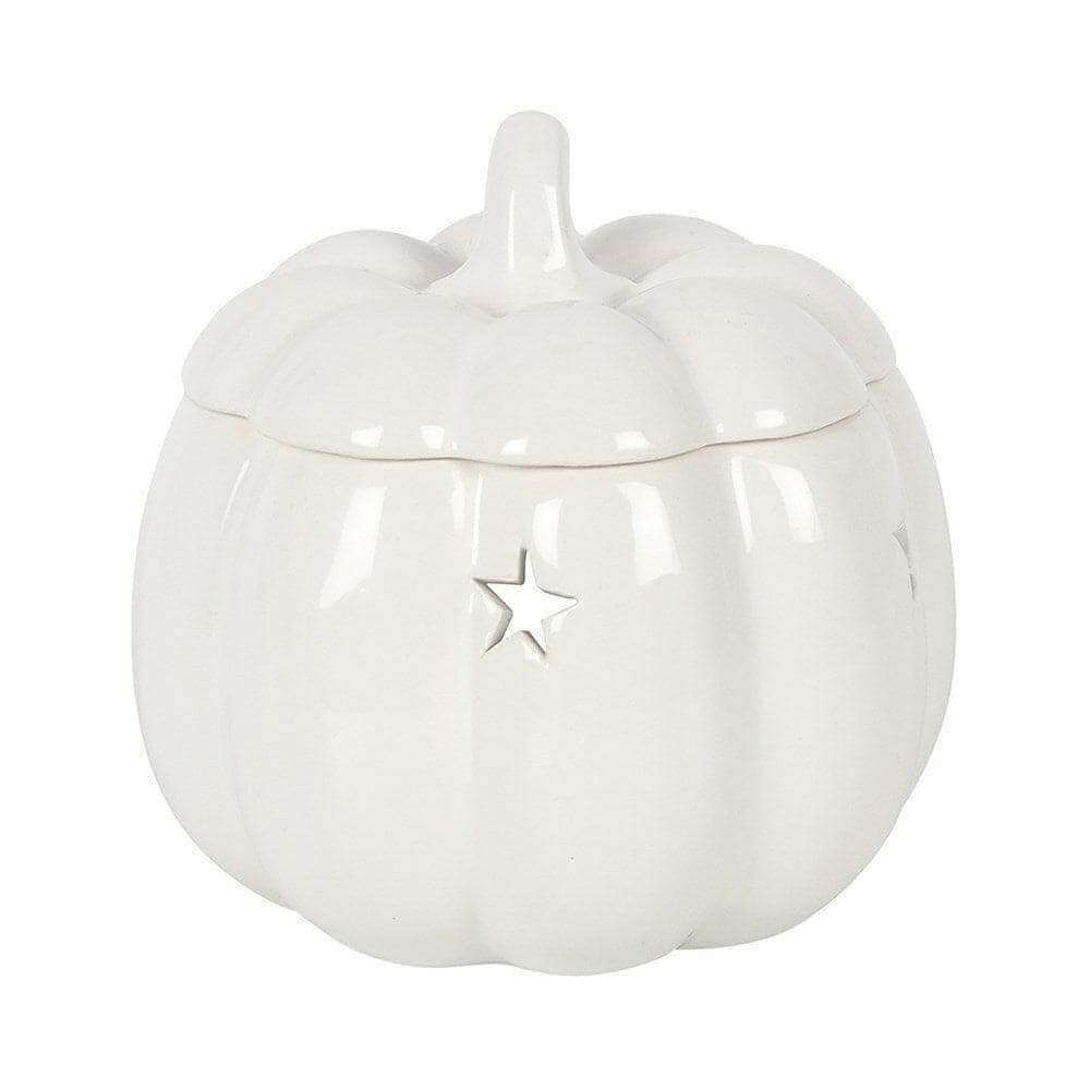 White ceramic pumpkin wax melt burner with hinged lid and star emblem on front