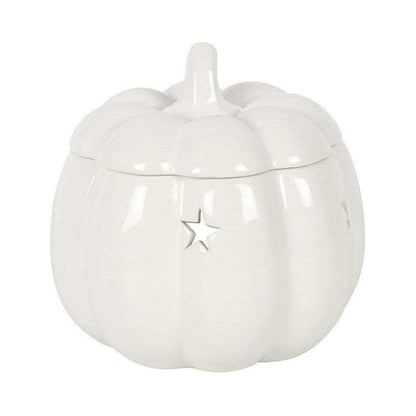 White ceramic pumpkin wax melt burner with hinged lid and star emblem on front